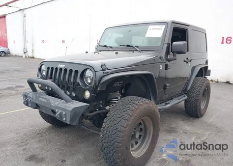2012 Jeep Wrangler Sport z USA, uszkodzony, nr VIN 1C4GJWAG4CL214339